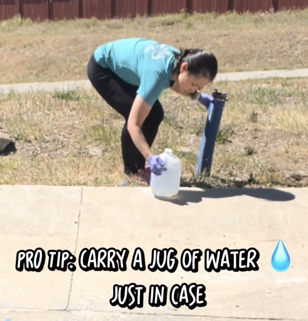 Carrying extra jug of water for cleaning stinky slinky