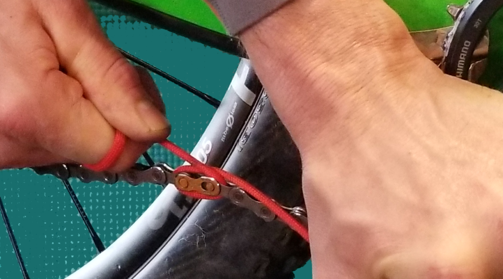 Using a shoelace to pop the quick link