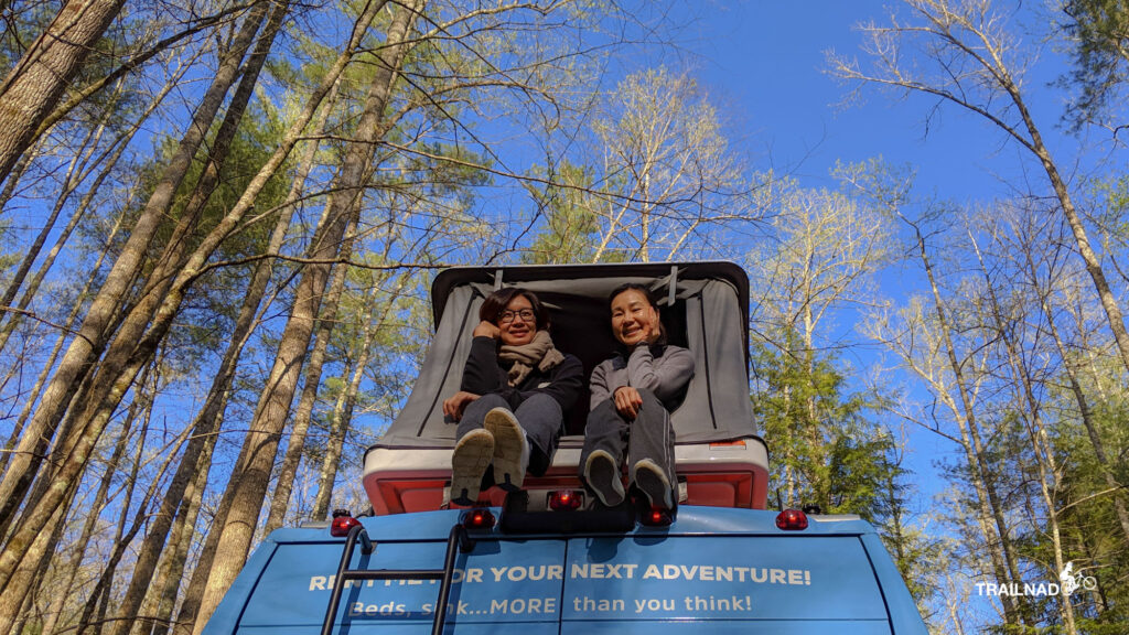 Bee and Jimmie on the roof top of the van