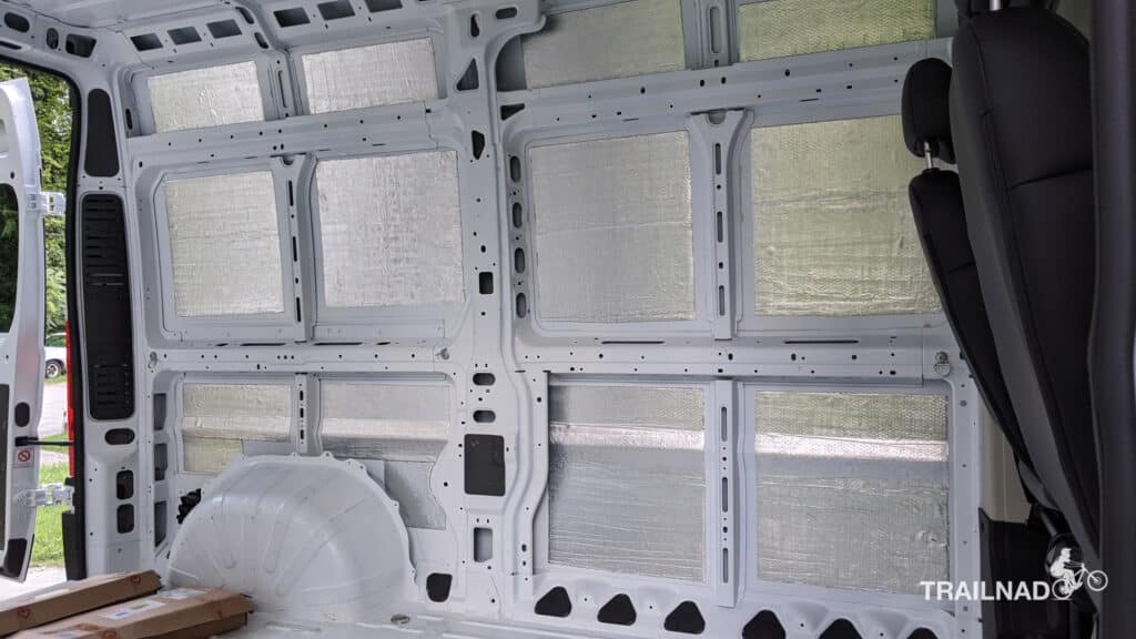 Sound deadening mat on cargo van side walls