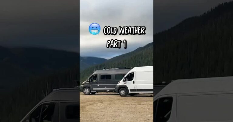 Camper van leaving a snowy high-elevation spot