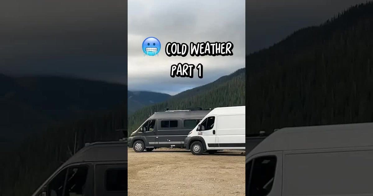 Camper van leaving a snowy high-elevation spot