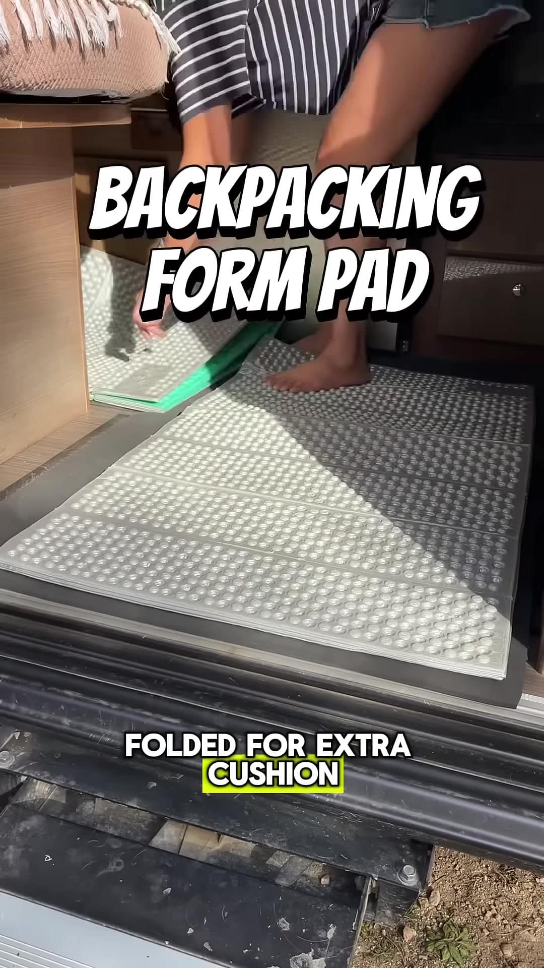 Folded foam sleeping pad on a yoga mat